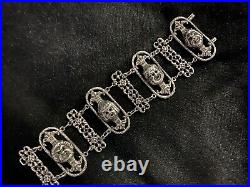 Antique Sterling silver Peruzzi style large bracelet decorated with Masks marked