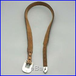 LOOK! A Navajo Guild Marked Sterling Silver Buckle Set on a Tooled Leather Belt