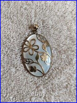 Mother of Pearl Pendant Marked 14kt Gold Over Sterling Silver with Flowers