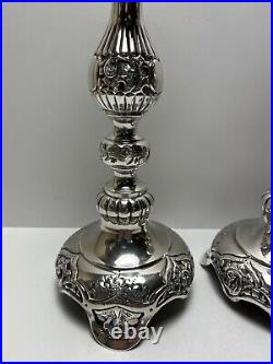 Ornate silver candlesticks marked sterling 84 pair of silver candlesticks