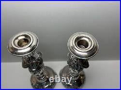 Ornate silver candlesticks marked sterling 84 pair of silver candlesticks