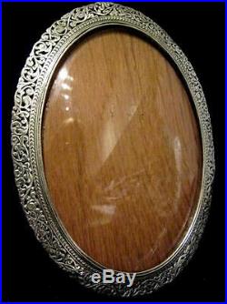 Silver and Oak Oval Frame with Unusual Concave Glass Netherlands Dutch Marks