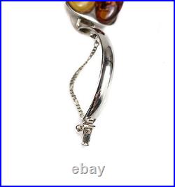 Sterling Silver Egg Yolk and Cognac Amber Modernist Bangle bracelet. Marked 925