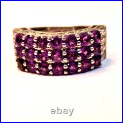 Sterling Silver Ring Marked 925 7 rows purple stones and baguette stones 5.25