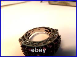 Sterling Silver Ring Marked 925 7 rows purple stones and baguette stones 5.25