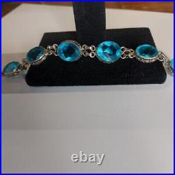 Vintage 925 sterling and Ocean Blue Topaz Engraved and Signed Bracelet