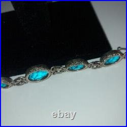 Vintage 925 sterling and Ocean Blue Topaz Engraved and Signed Bracelet