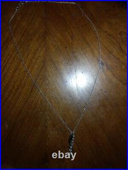 Vintage Necklace Pendant Marked CW 925 with CZ stones in row and s shape