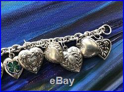 Vintage Sterling Silver Repousse Puffy Heart Charm bracelet. Marked 925