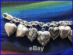 Vintage Sterling Silver Repousse Puffy Heart Charm bracelet. Marked 925