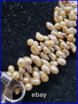 Vintage fresh water Rice Pearls 3 strands lustrous gold pendant is marked 925