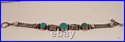 Vtg. Sterling Silver bracelet withcabochon turquoise/silver designs-marked 925A
