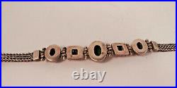 Vtg. Sterling Silver bracelet withcabochon turquoise/silver designs-marked 925A